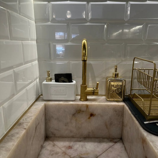 Unlacquered brass single hole sink faucet