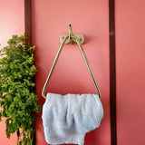 unalqcuered brass towel triangle holder