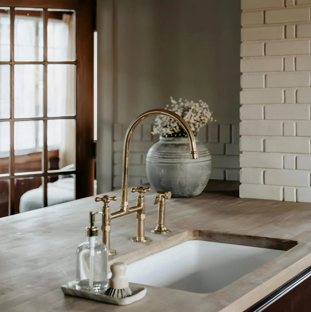 unlacquered brass bridge faucet with sprayer