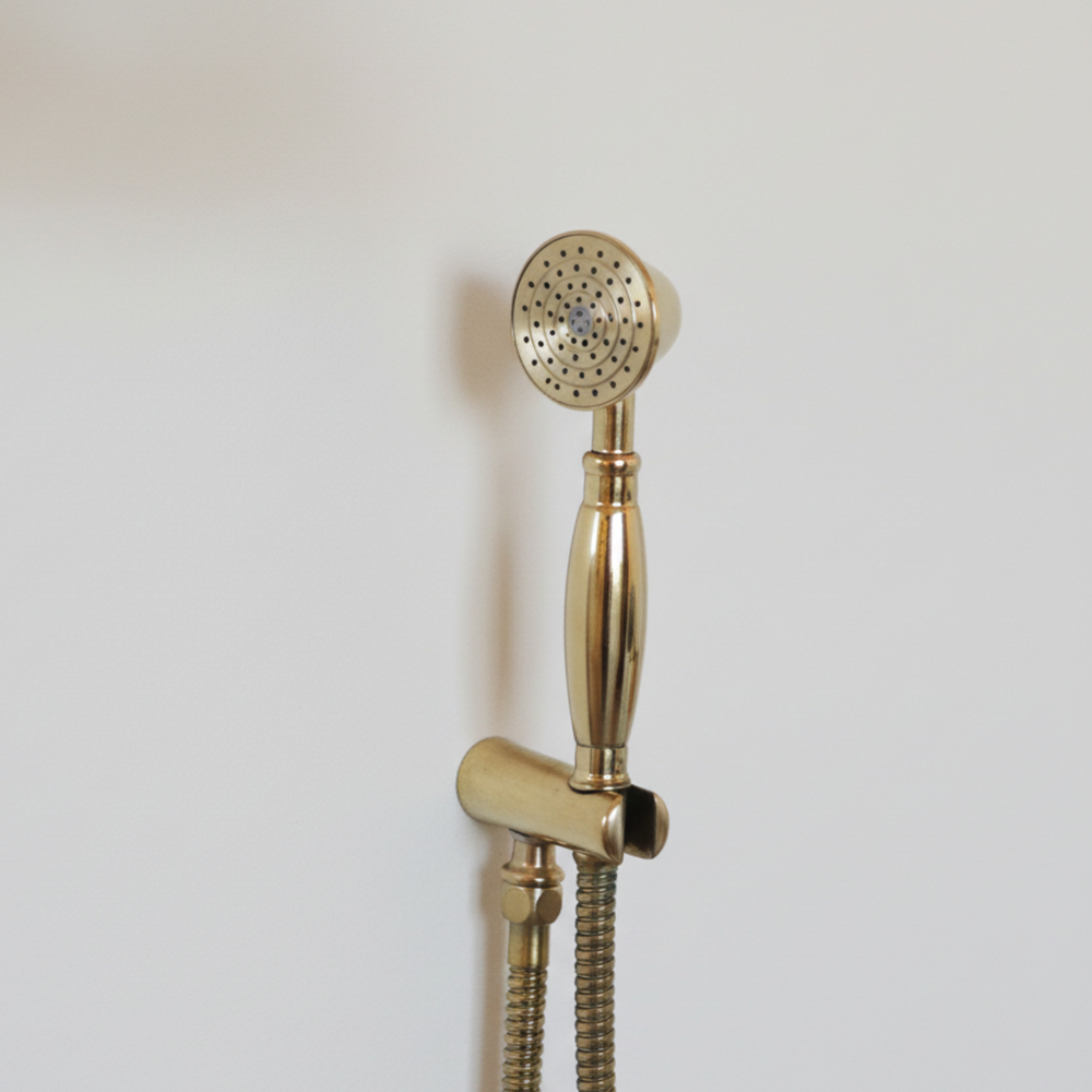unlacquered brass shower hand