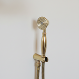 unlacquered brass shower hand