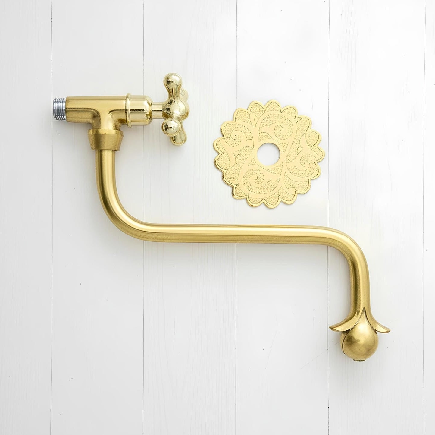     Traditional Moroccan brass kitchen pot filler faucet with a long articulated arm, designed for filling pots directly on the stove.