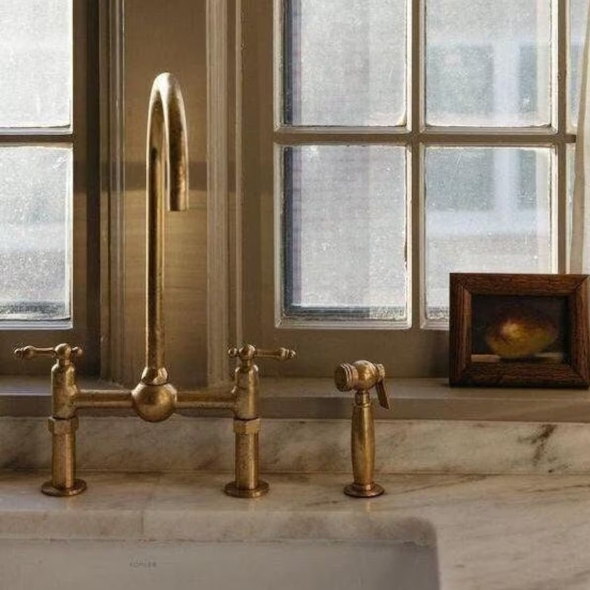 aged brass bridge faucet 