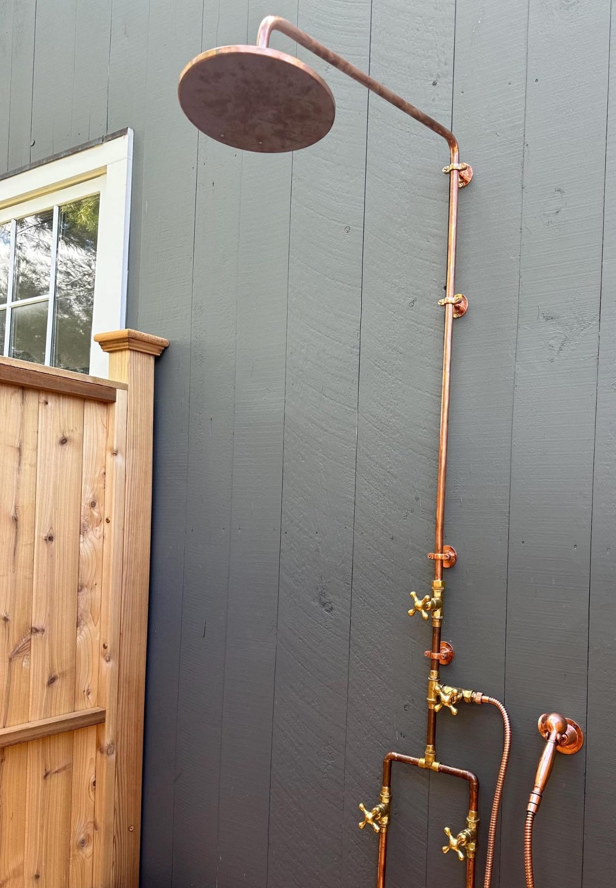 Outdoor shower system with copper shower head and handheld