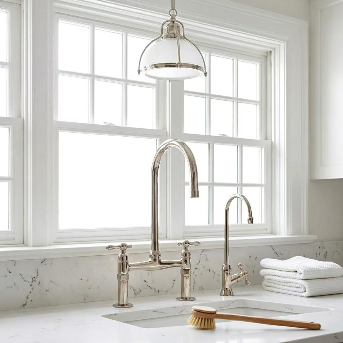 polished nickel bridge faucet with cold water 