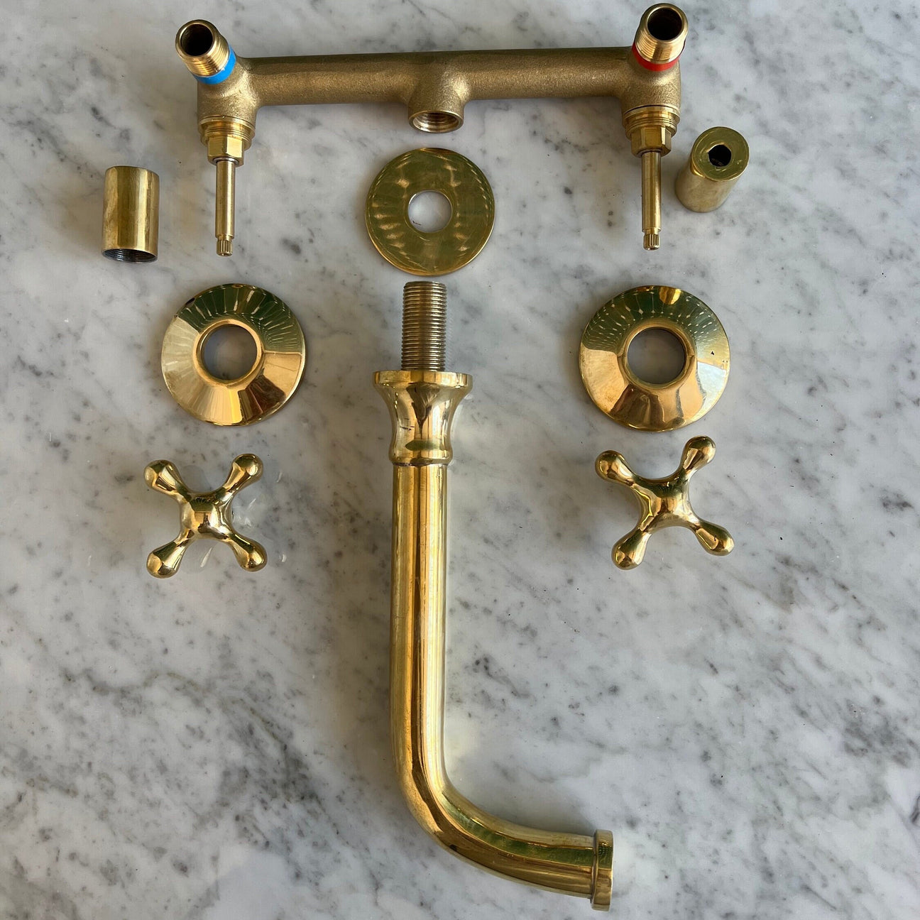 unlacquered brass wall mounted faucet