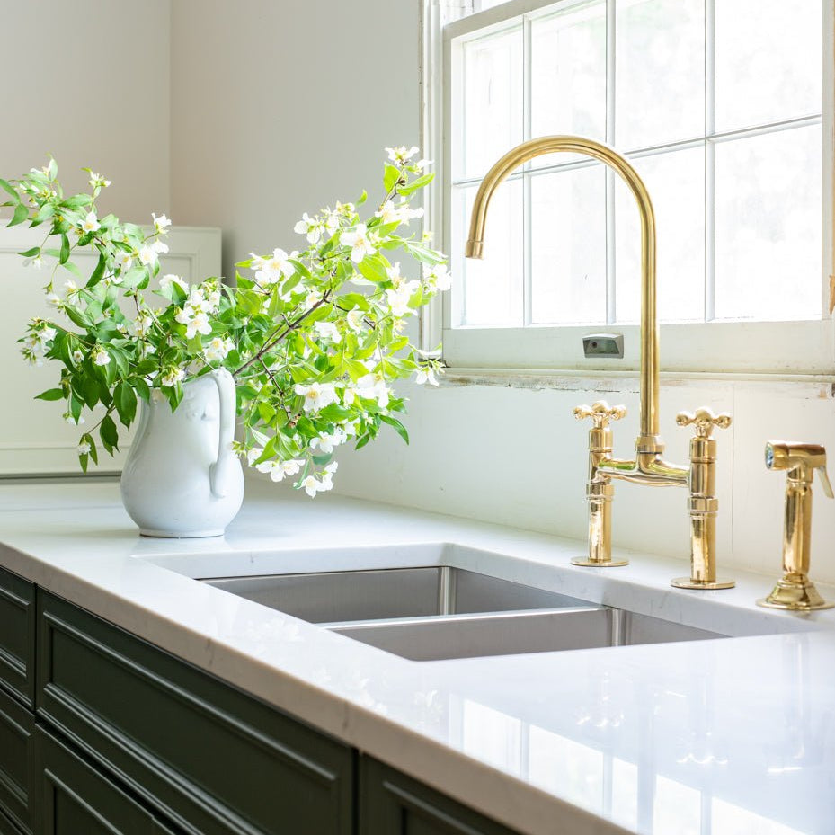 8" unlacquered brass bridge faucet
