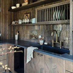 unlacquered brass kitchen faucet with sprayer