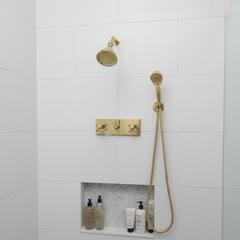 brass shower head and control panel 