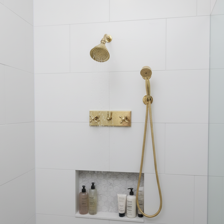 brass shower head and control panel 