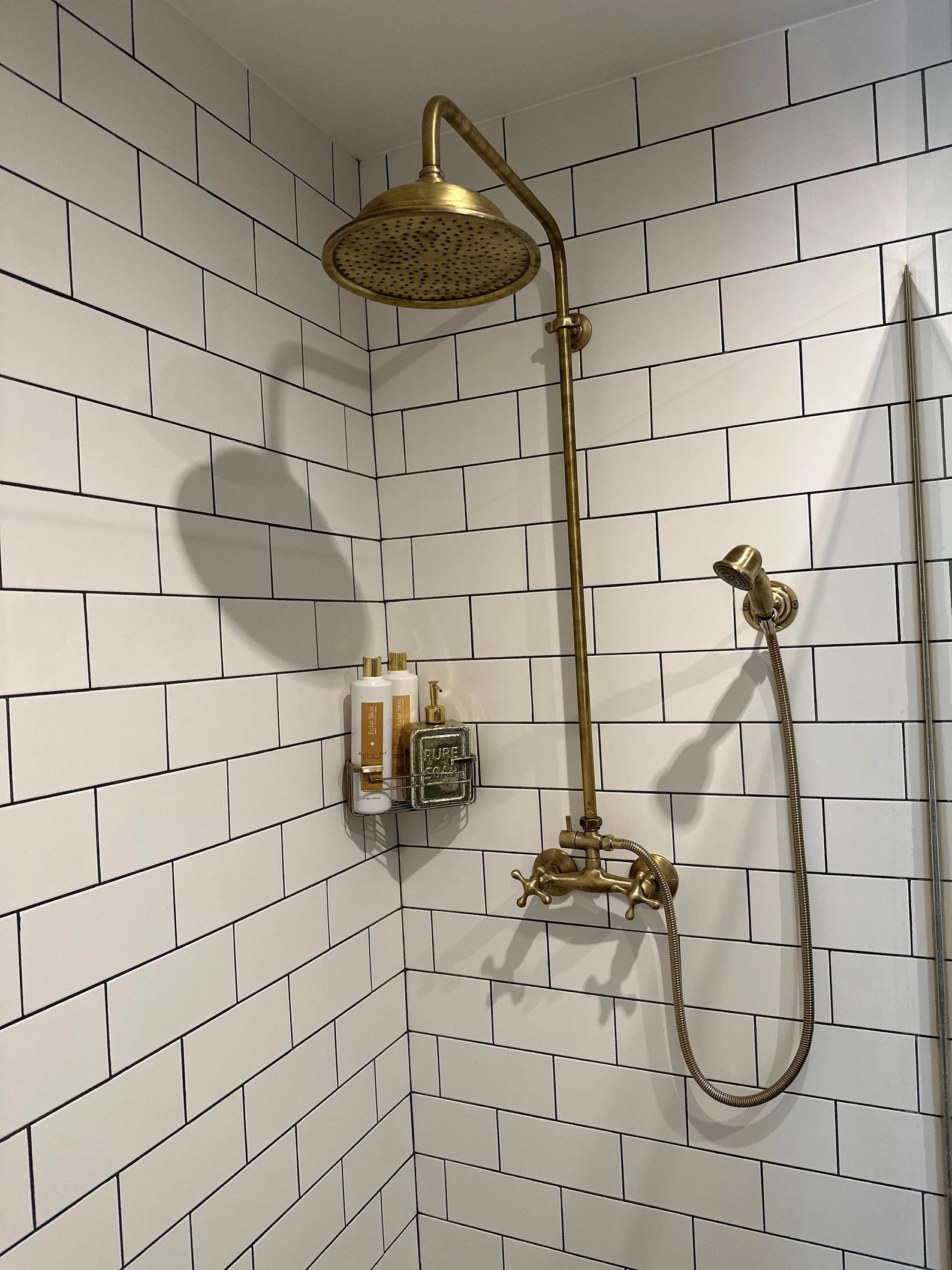 unlacquered brass shower set