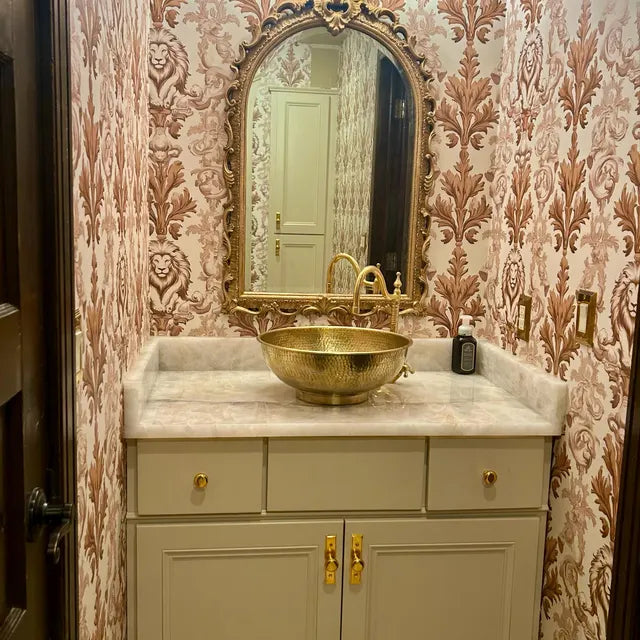 unlacquered brass single hole vanity faucet