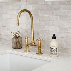 unlaquered brass bridge faucet