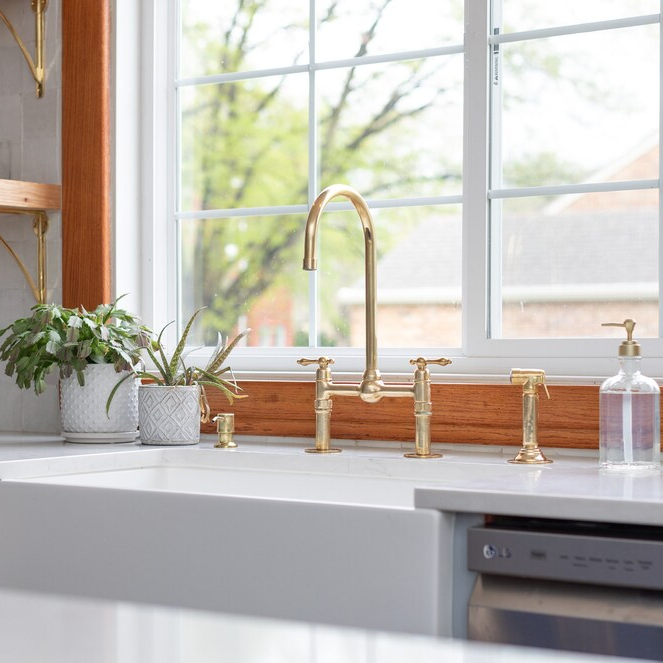 unpainted brass kitchen bridge faucet